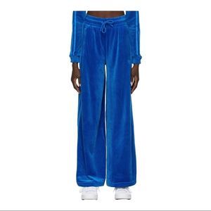Adidas X Jeremy Scott women’s velour track pants in dark blue size XS
